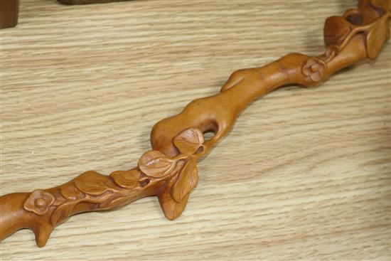 A Chinese wood ruyi sceptre, a Yixing teapot and a ceramic wall pocket ruyi sceptre length 47cm